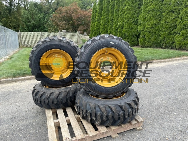 NEW 10-16.5 Skid Steer Tires/Rims- $1,225.00